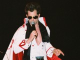 elvis_2004_with_mic_and_cape